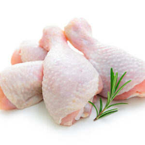 Home raw chicken legs on white background isolated